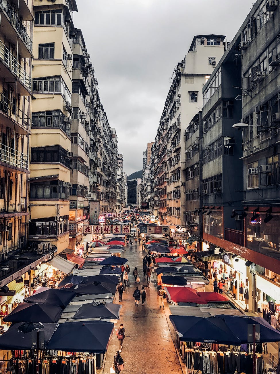 photo of a pathway with gray and black buildings
types of market 