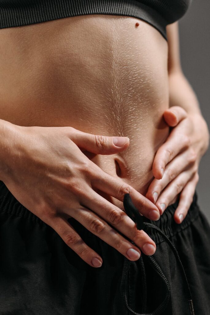 person in black pants holding womans hand
Antibodies 